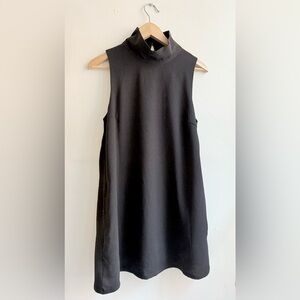 Essue black cocktail dress in size S.